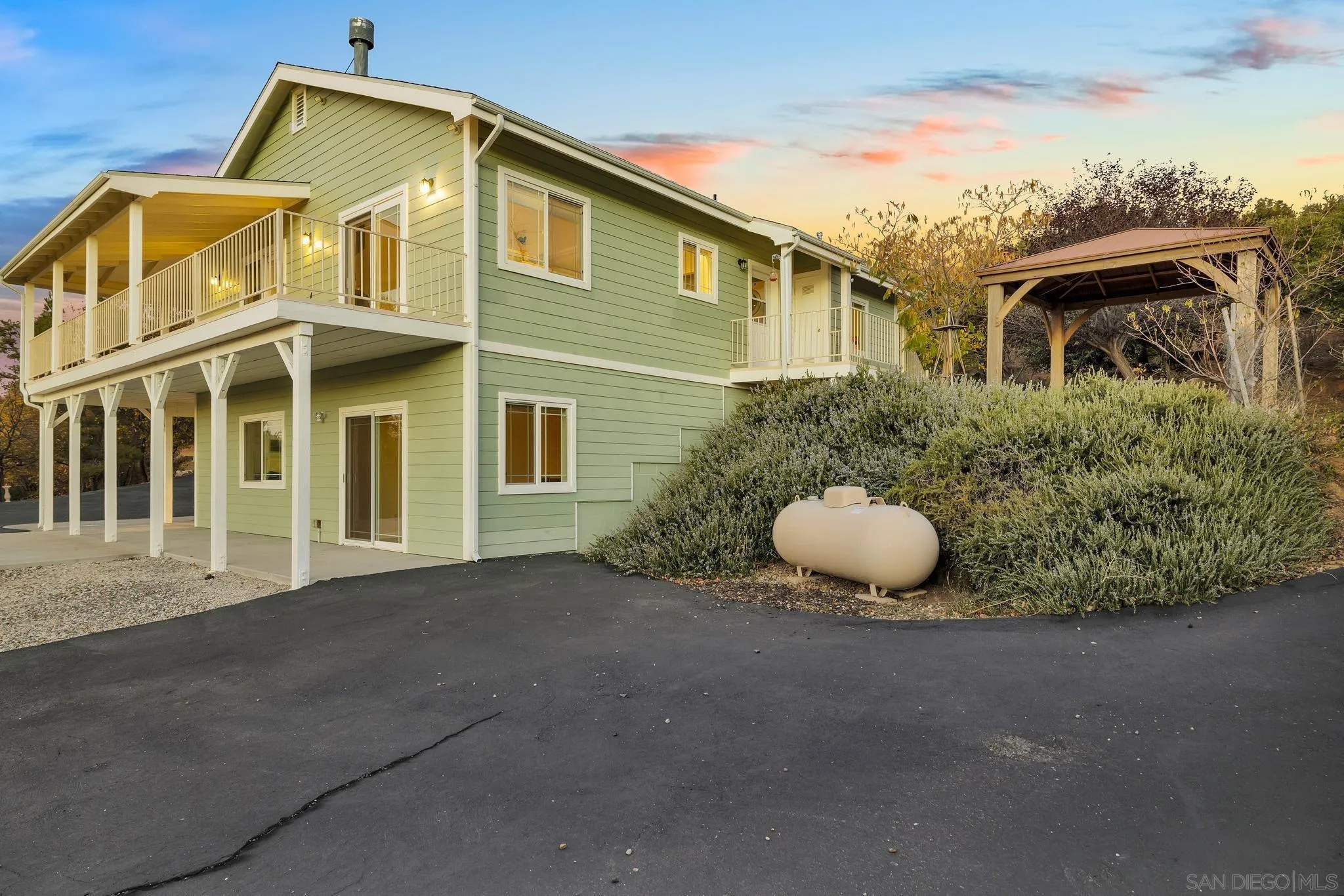 17735 Harrison Park Road Julian, CA 92036 - Photo 4 of 43 a front view of a house with a yard