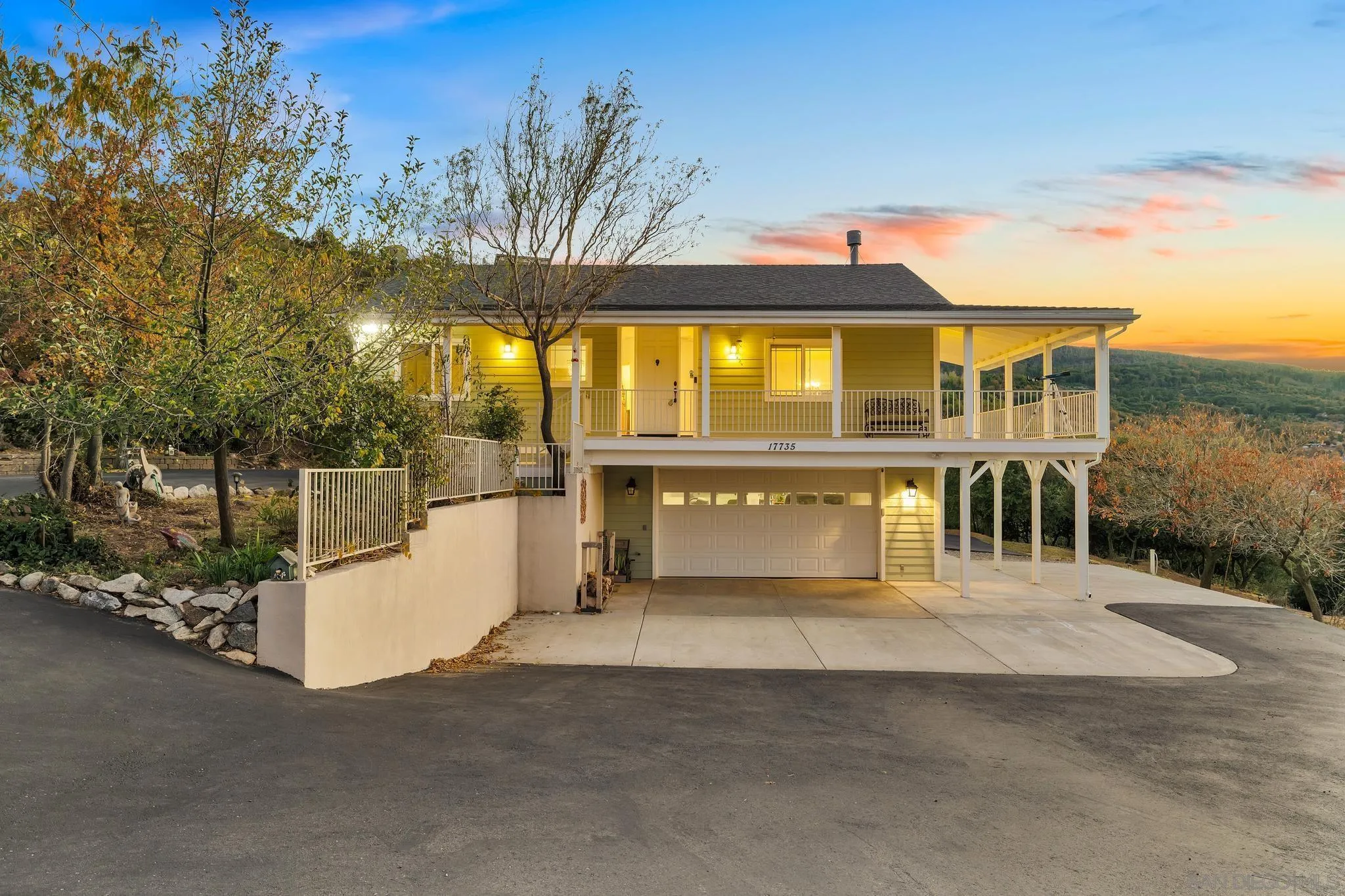 17735 Harrison Park Road Julian, CA 92036 - Photo 9 of 43 a front view of a house with a garage