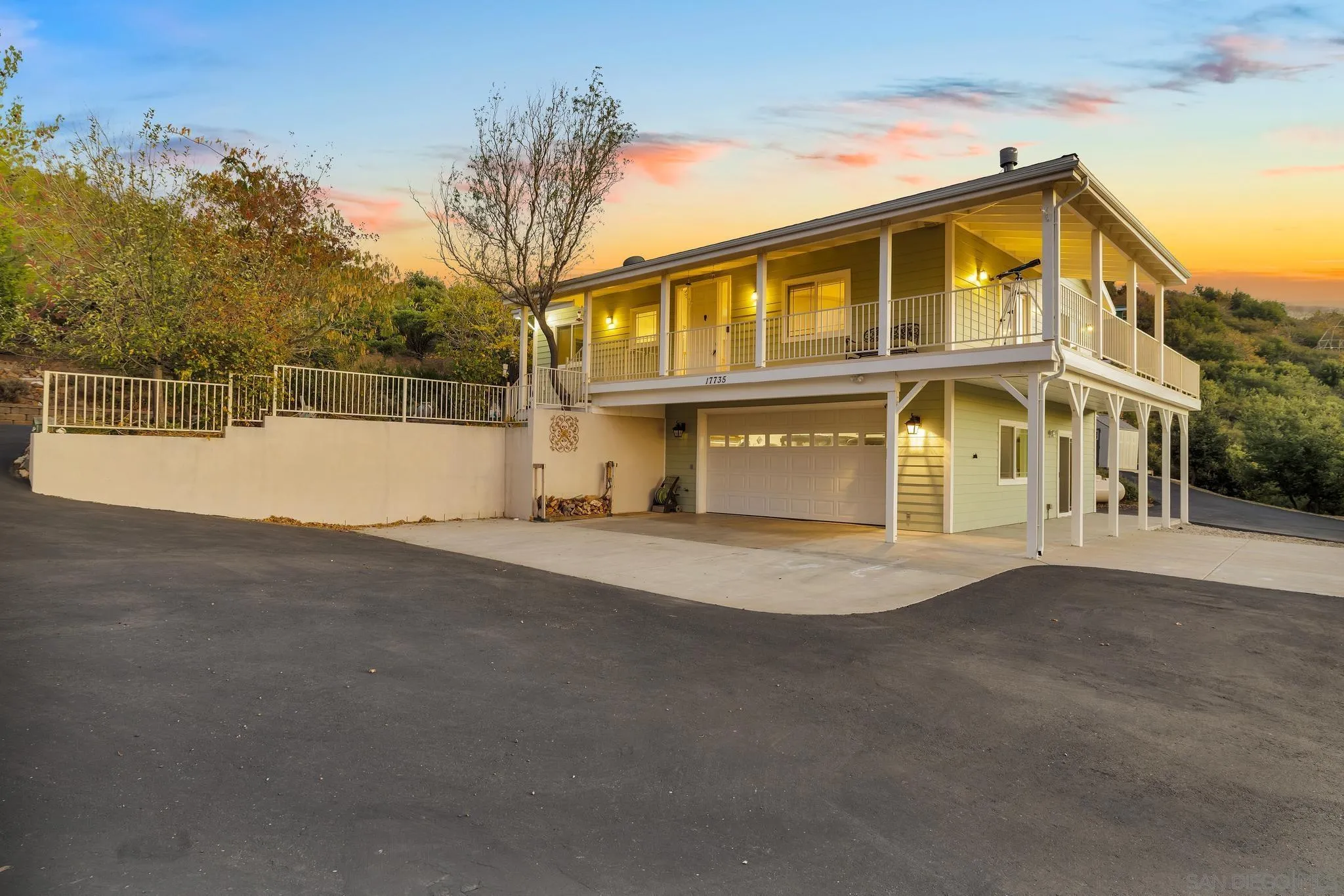 17735 Harrison Park Road Julian, CA 92036 - Photo 10 of 43 a front view of a house with a garden
