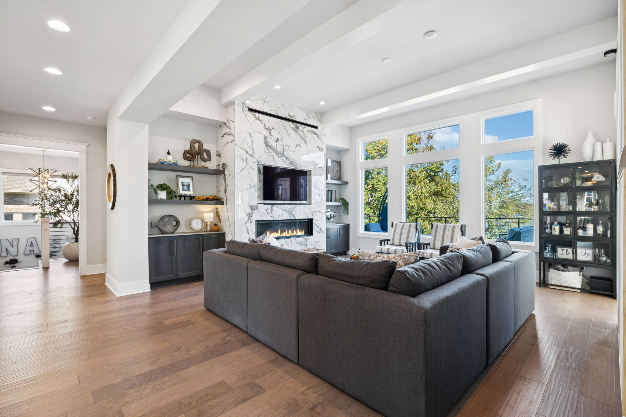 809 Burton Point Road Mount Juliet, TN 37122 - Photo 26 of 75 a living room with furniture windows and wooden floor