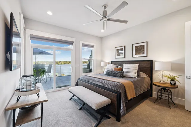 a bedroom with a bed and window