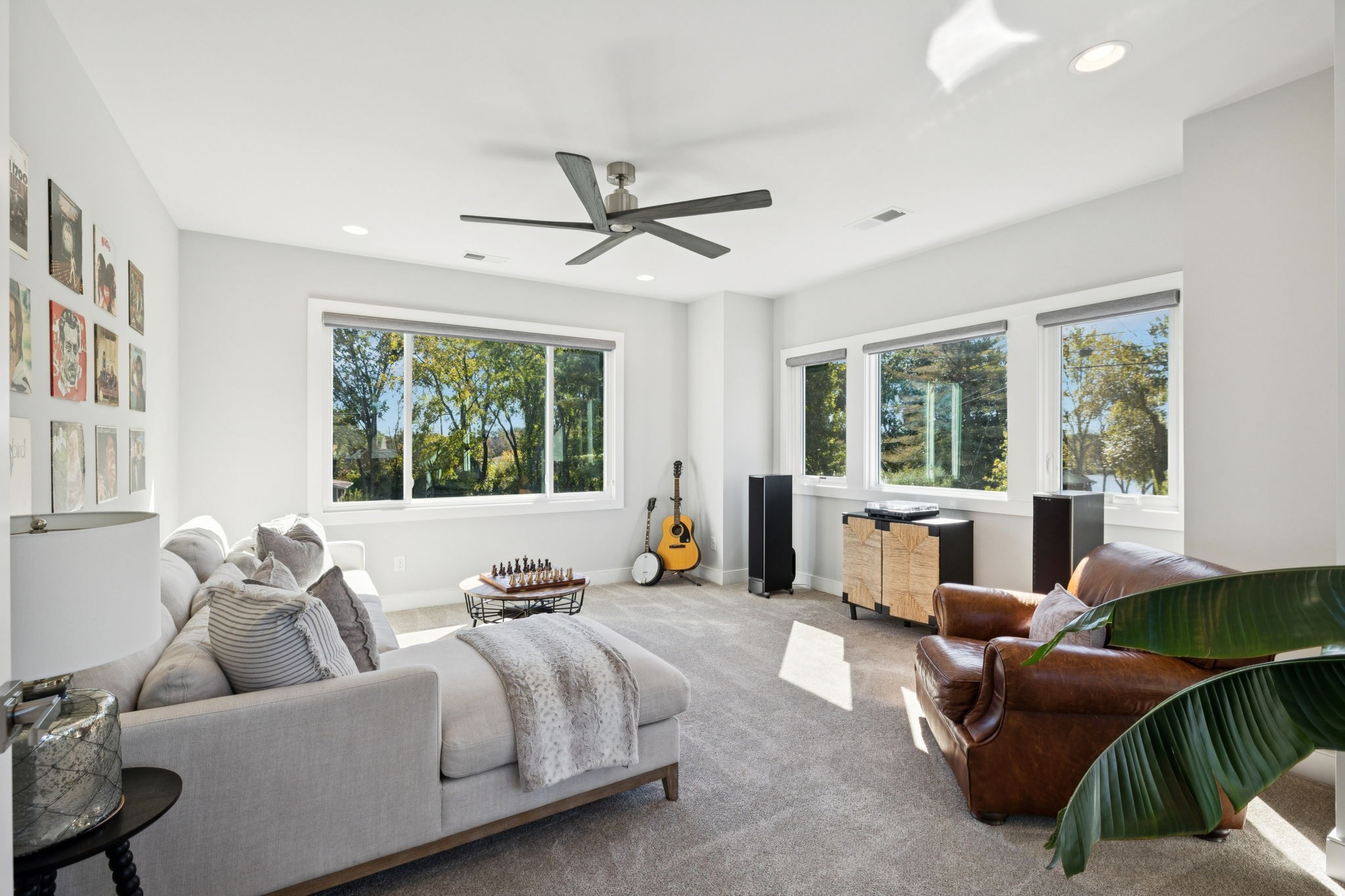 809 Burton Point Road Mount Juliet, TN 37122 - Photo 31 of 75 a living room with furniture ceiling fan and a large window