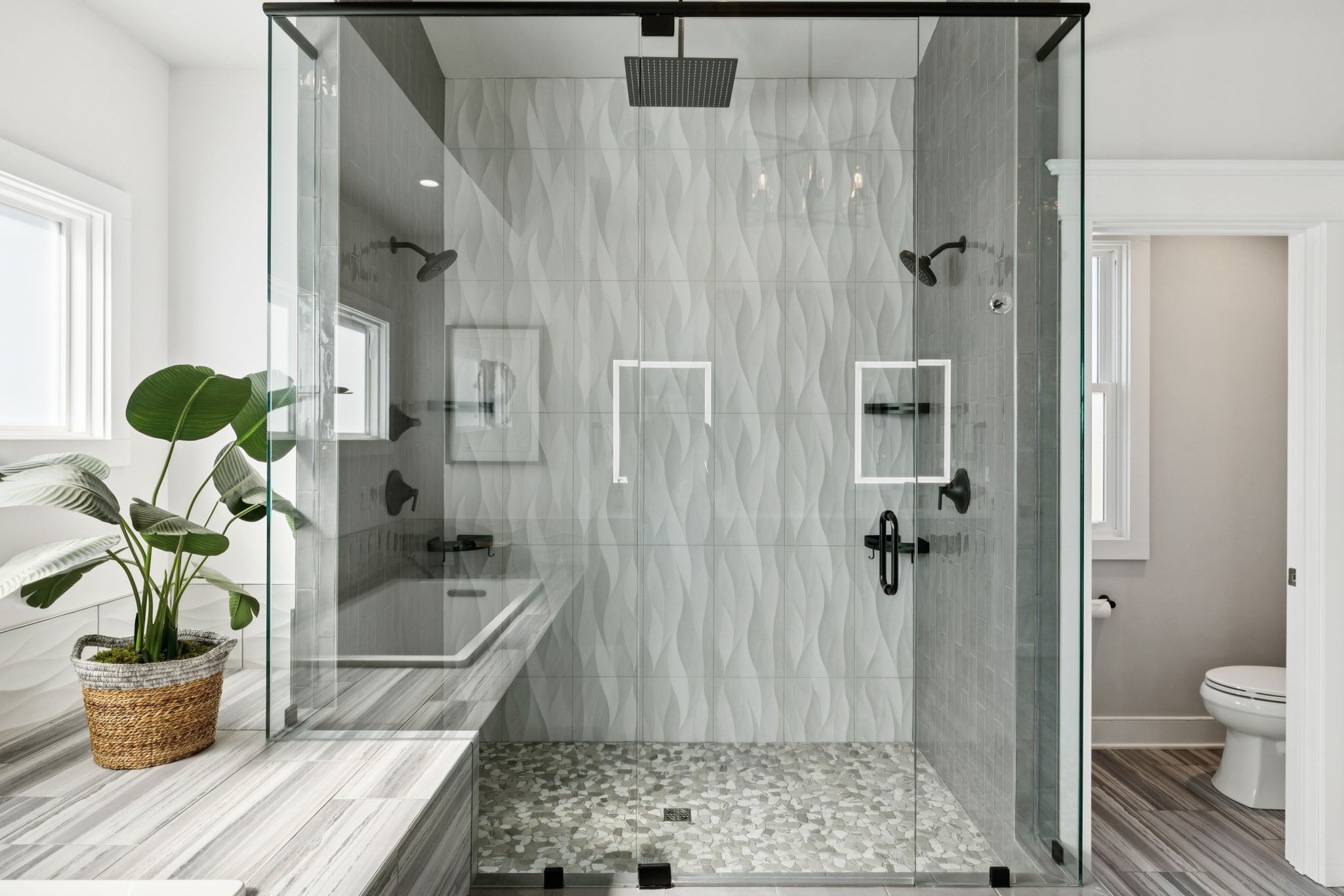 809 Burton Point Road Mount Juliet, TN 37122 - Photo 46 of 75 a bathroom with a bathtub and a potted plant