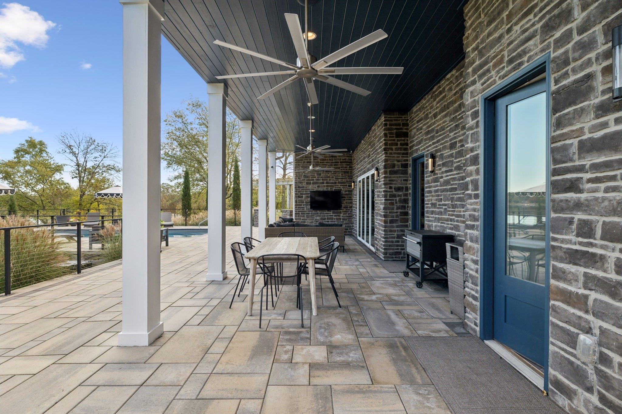 809 Burton Point Road Mount Juliet, TN 37122 - Photo 63 of 75 a view of a porch with chairs and a table