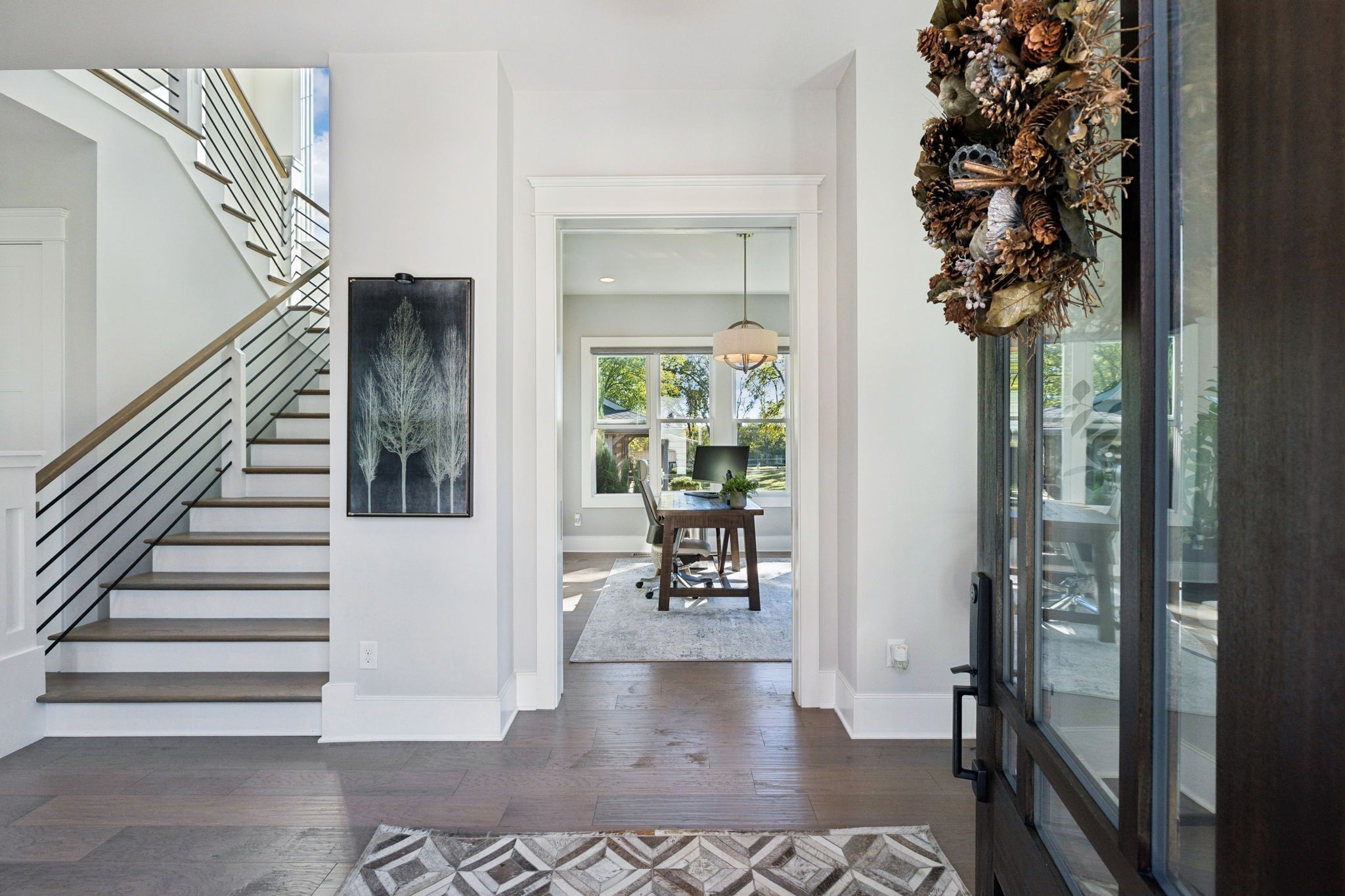 809 Burton Point Road Mount Juliet, TN 37122 - Photo 8 of 75 a view of entryway and hall with wooden floor