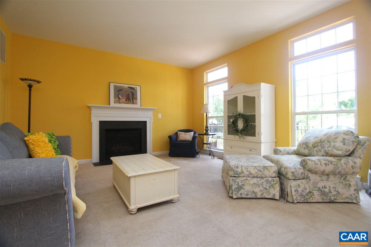630 Rainier Road Charlottesville, VA 22903 - Photo 8 of 30 with fireplace, open to kitchen