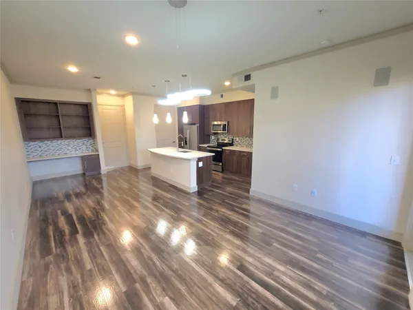 a view of a living room and dining room