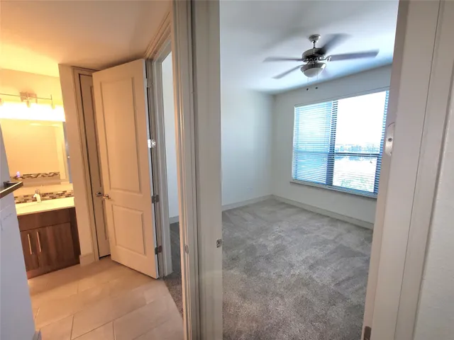 a view of an empty room and window