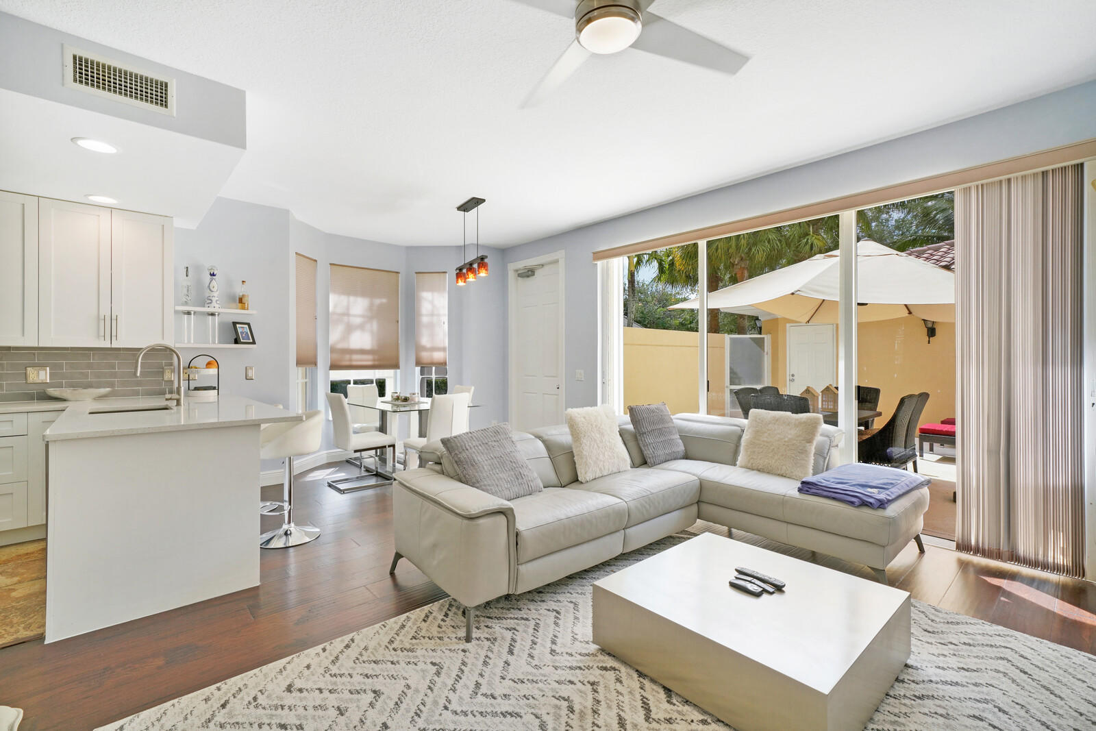 1615 Frederick Small Road Jupiter, FL 33458 - Photo 15 of 32 a living room with furniture and a large window