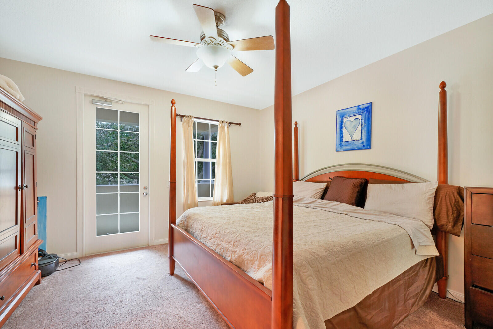 1615 Frederick Small Road Jupiter, FL 33458 - Photo 21 of 32 a bedroom with a bed and a window
