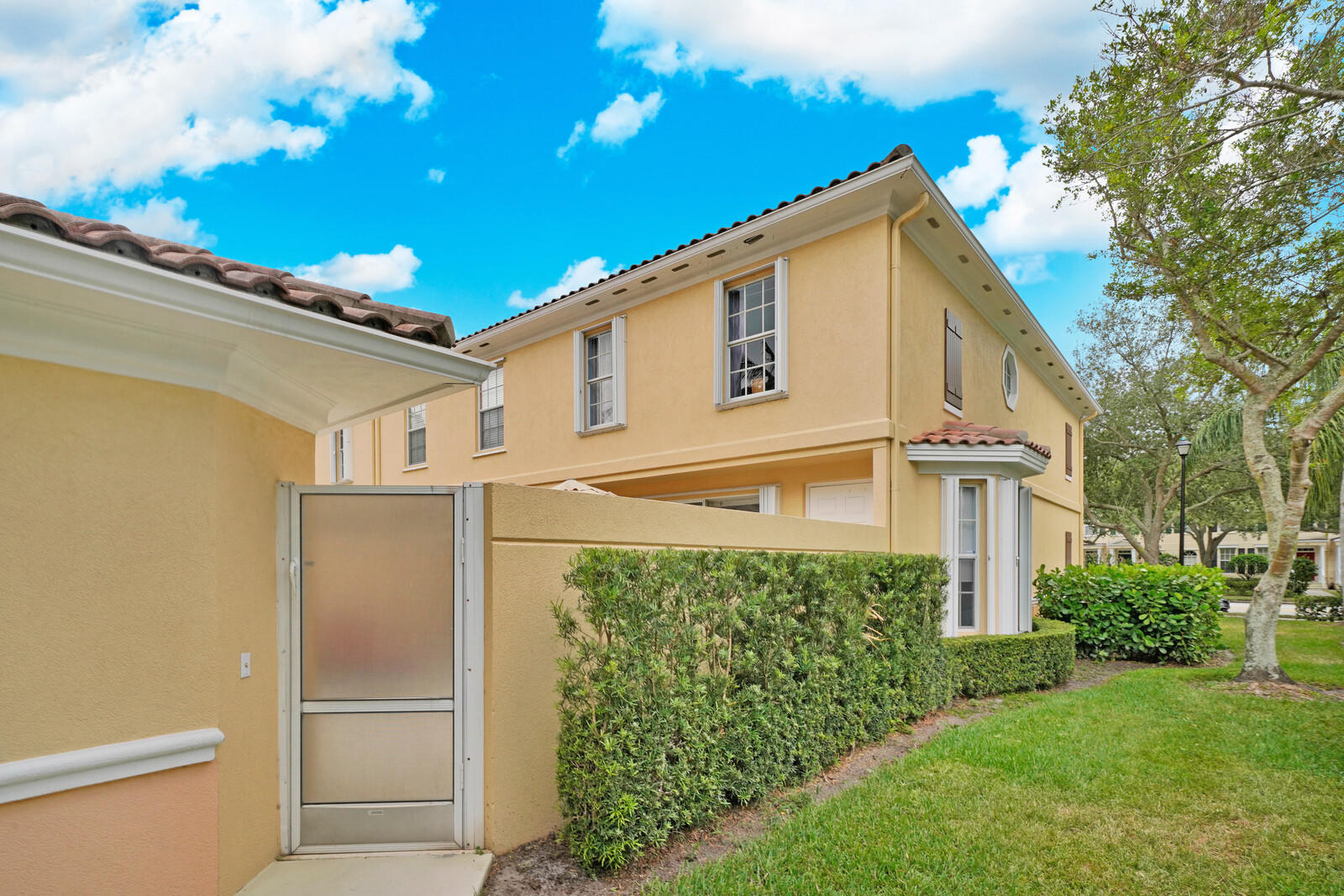 1615 Frederick Small Road Jupiter, FL 33458 - Photo 31 of 32 a view of a house with a yard
