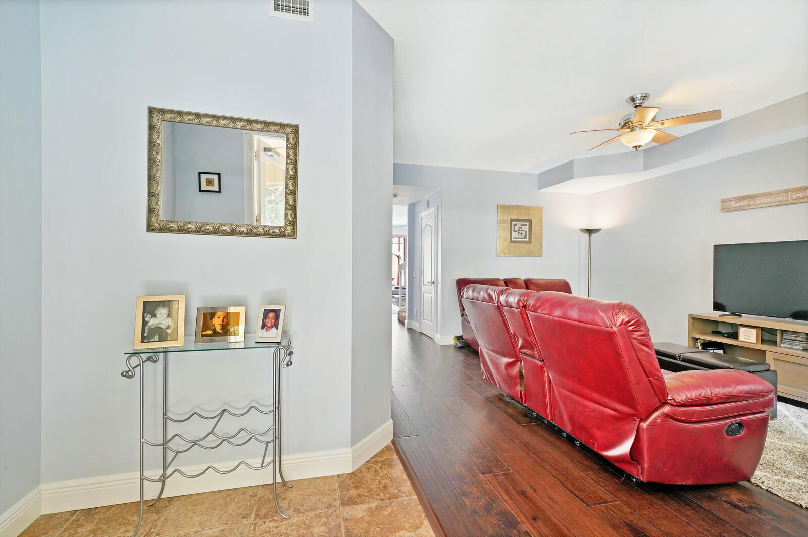 1615 Frederick Small Road Jupiter, FL 33458 - Photo 5 of 32 a living room with furniture and a flat screen tv