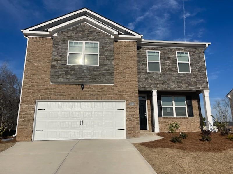 1720 Limousin Way Stockbridge, GA 30281 - Photo 1 of 1 a front view of a house with yard
