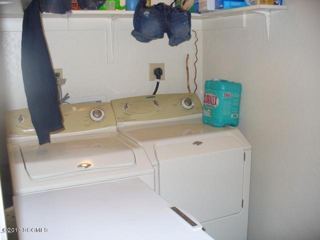 1013 Paseo Guebabi Rio Rico, AZ 85648 - Photo 12 of 19 a utility room with dryer and washer
