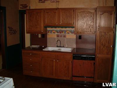31 North 3rd Street Coplay, PA 18037 - Photo 3 of 11 a kitchen with a refrigerator and a sink