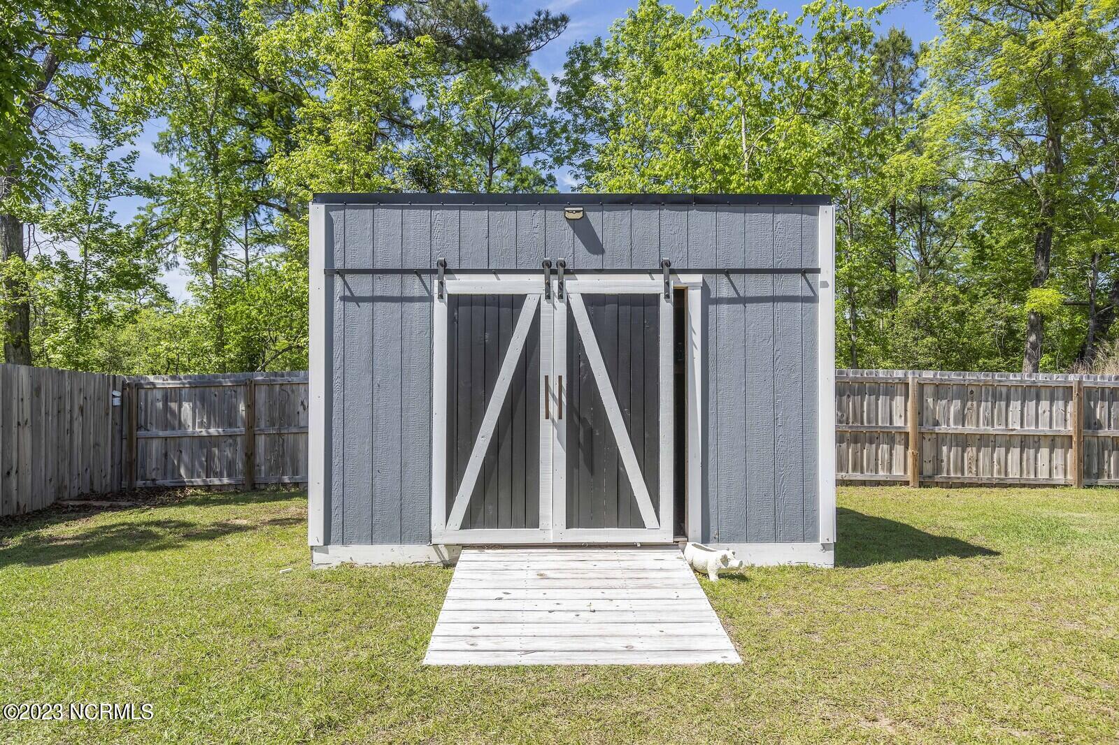 532 Toms Creek Road Rocky Point, NC 28457 - Photo 47 of 59 Storage shed