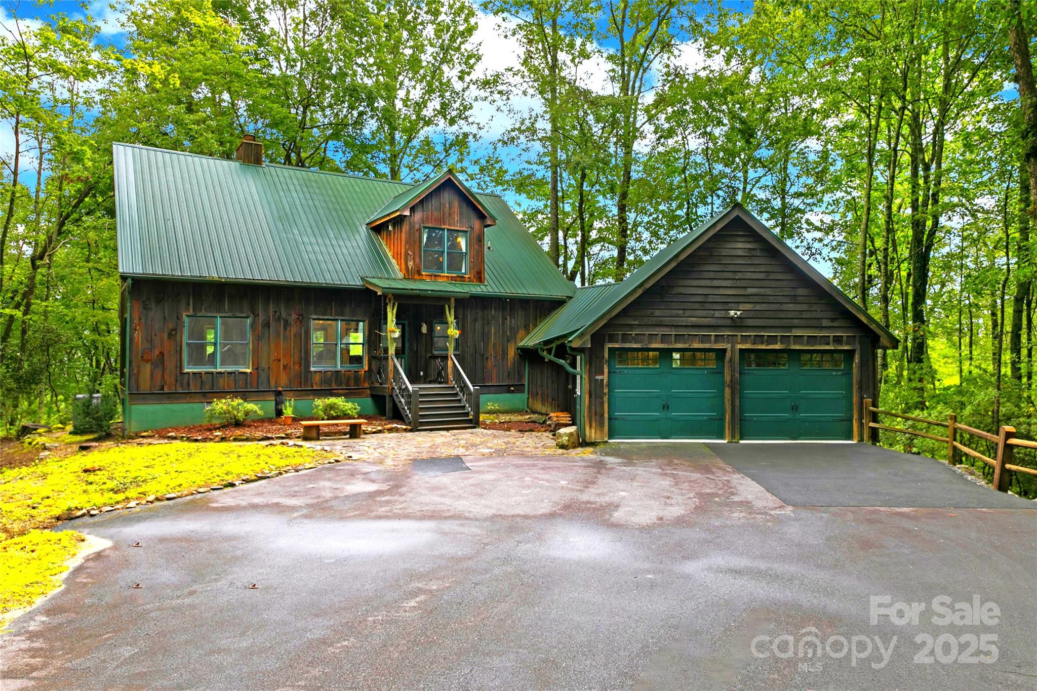 a view of an house with backyard space and balcony