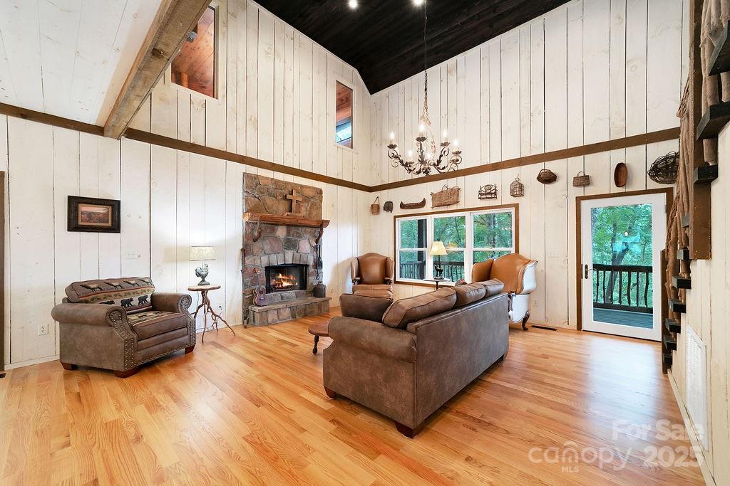 418 Sandy Lane Brevard, NC 28712 - Photo 16 of 45 a living room with furniture fireplace and flat screen tv