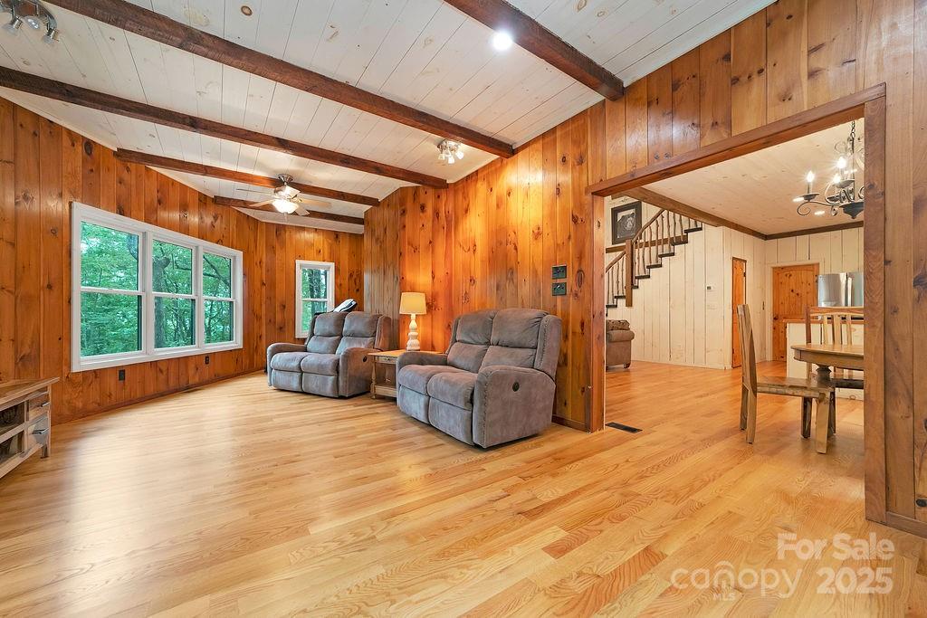 418 Sandy Lane Brevard, NC 28712 - Photo 24 of 45 a living room with furniture and large windows
