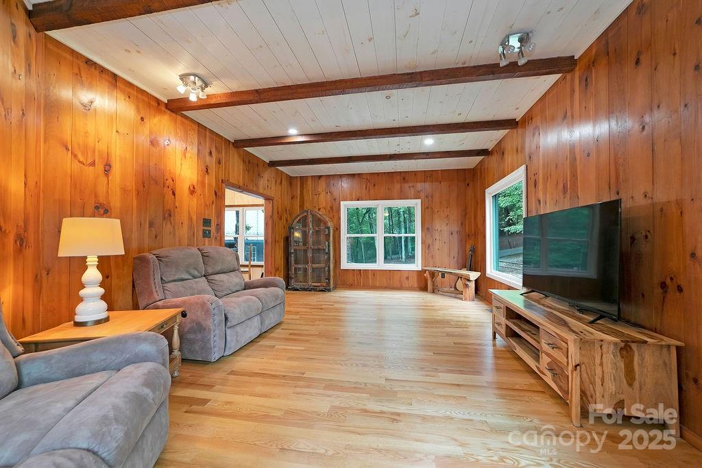 418 Sandy Lane Brevard, NC 28712 - Photo 26 of 45 a living room with furniture and a flat screen tv
