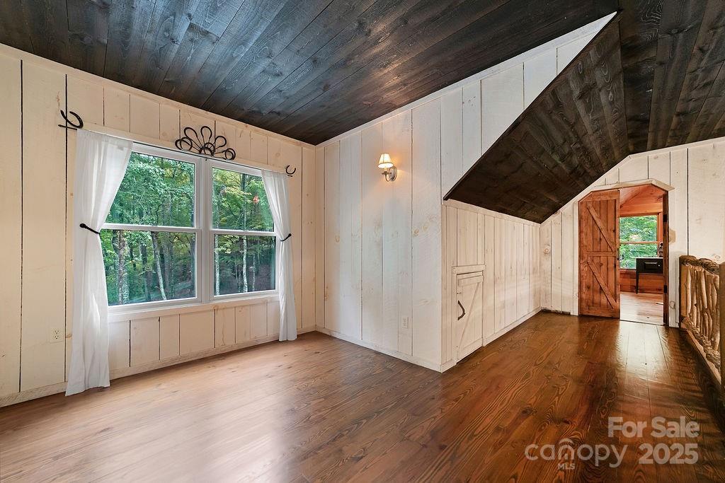 418 Sandy Lane Brevard, NC 28712 - Photo 37 of 45 a view of an entryway with wooden floor