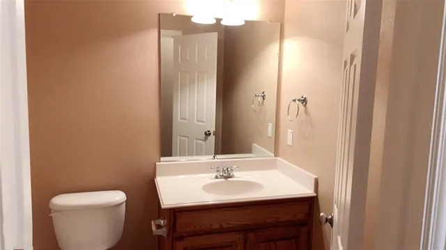 a view of cabinets and window