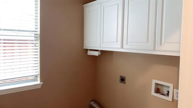 a view of a room with a window