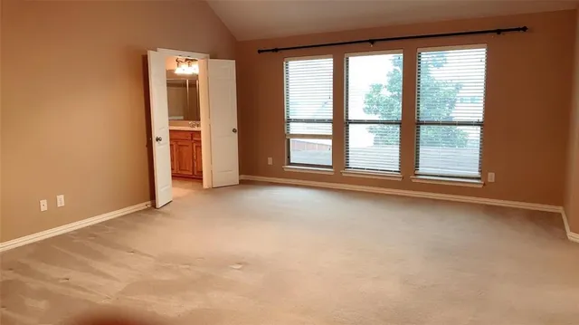 a bedroom with a window