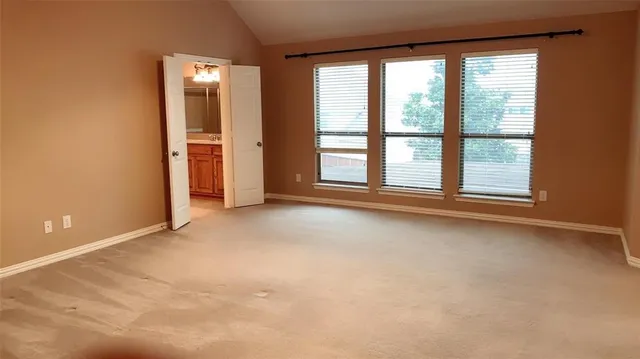 a bathroom with a sink vanity tub and shower