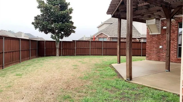 a view of a porch with a backyard