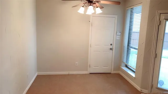 a kitchen with a stove a refrigerator and a sink
