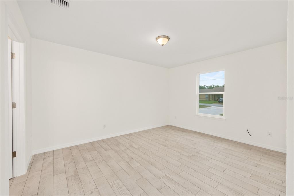 229 Locust Lane Ocala, FL 34472 - Photo 18 of 28 wooden floor in a room
