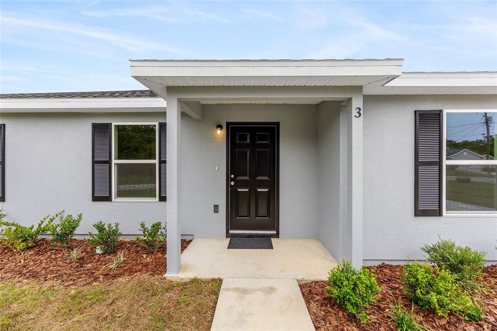 229 Locust Lane Ocala, FL 34472 - Photo 4 of 28 a front view of a house