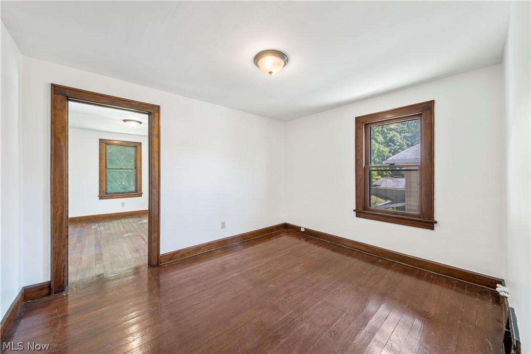 317 Ruckel Road Akron, OH 44305 - Photo 8 of 30 Spare room with dark wood-type flooring