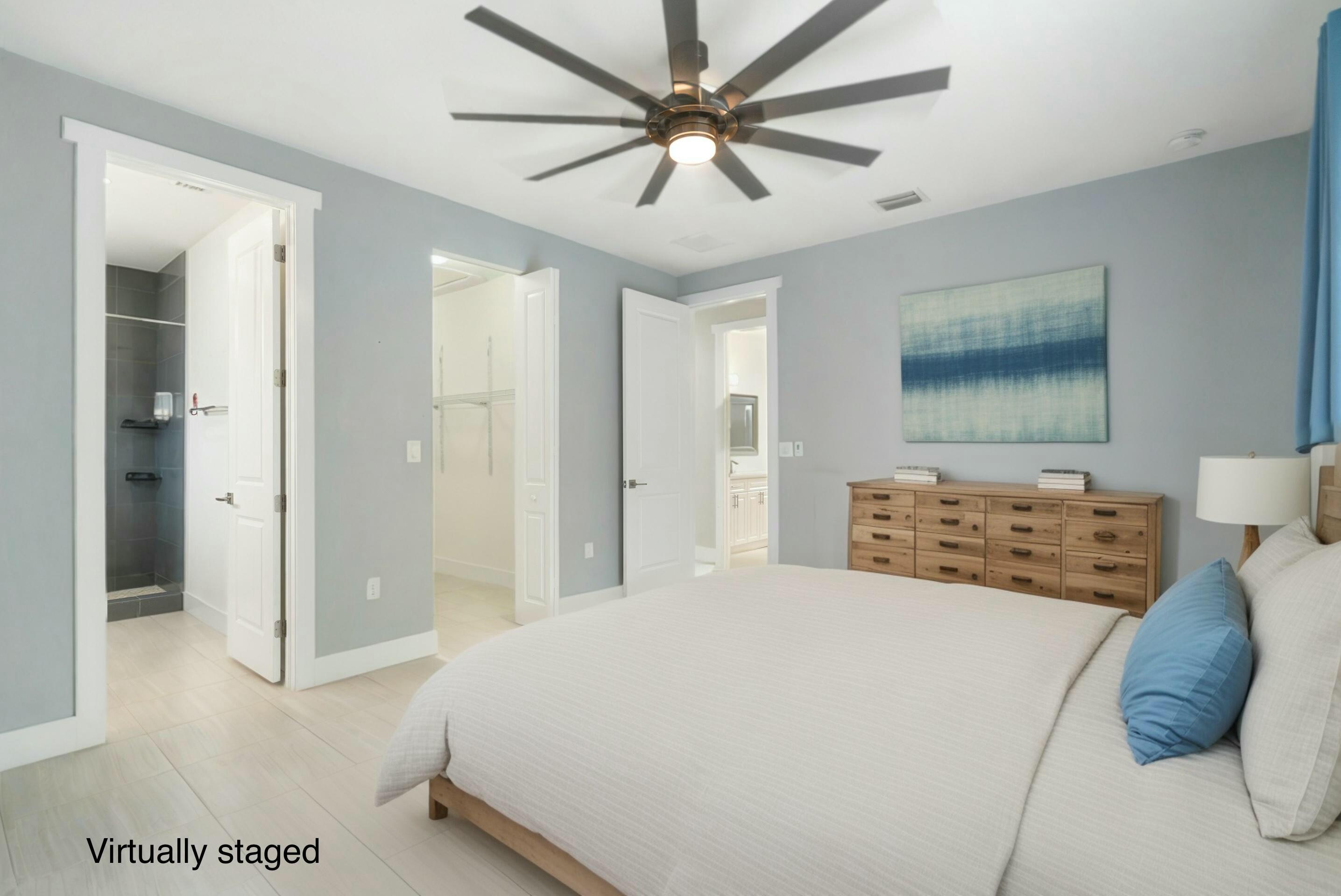 582 Boyd Drive Key Largo, FL 33037 - Photo 16 of 36 a bedroom with a bed and a painting on the wall