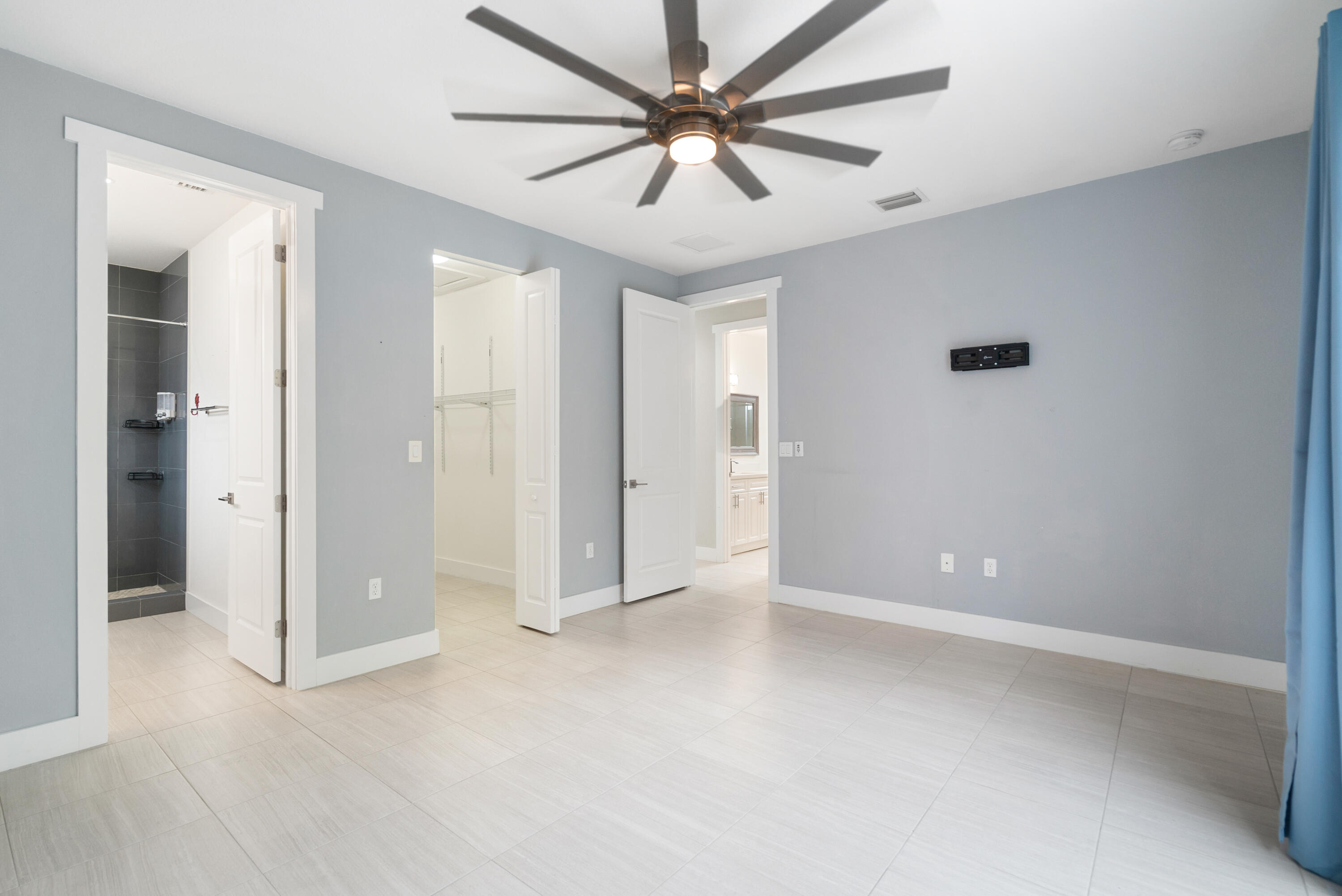582 Boyd Drive Key Largo, FL 33037 - Photo 17 of 36 an empty room with closet and a ceiling fan
