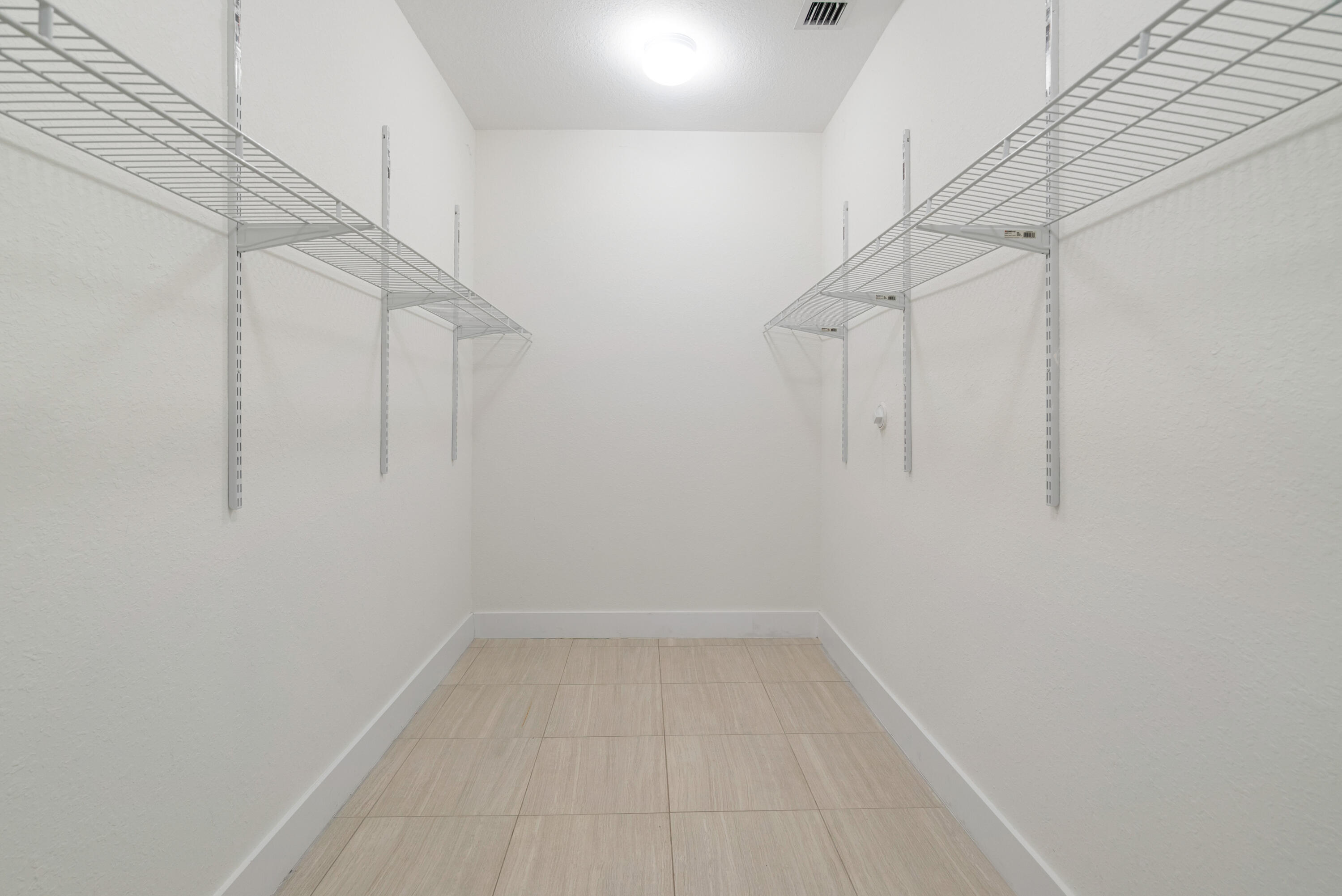 582 Boyd Drive Key Largo, FL 33037 - Photo 18 of 36 a view of small space with racks on the wall