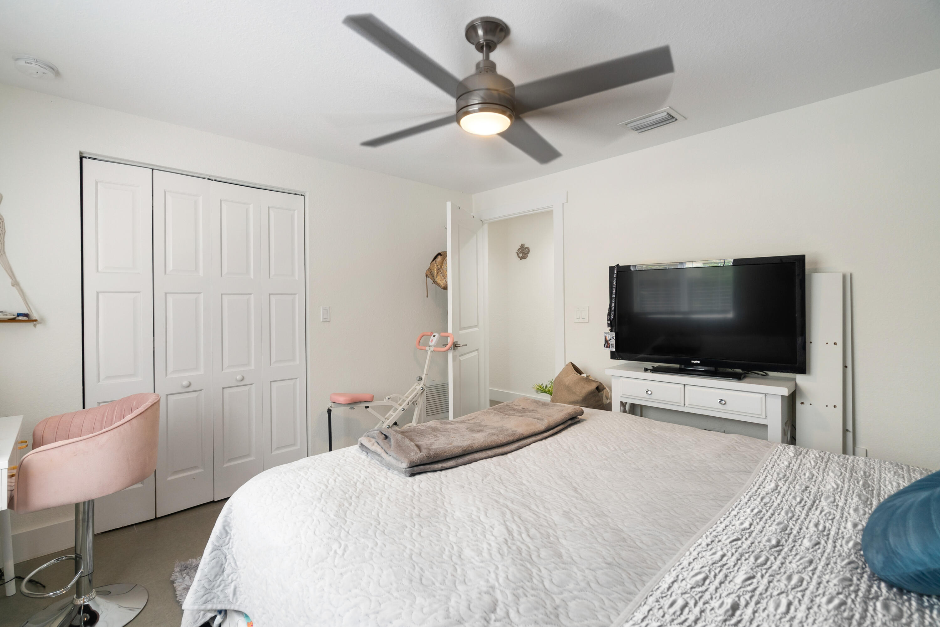582 Boyd Drive Key Largo, FL 33037 - Photo 27 of 36 a bedroom with a bed and a flat screen tv