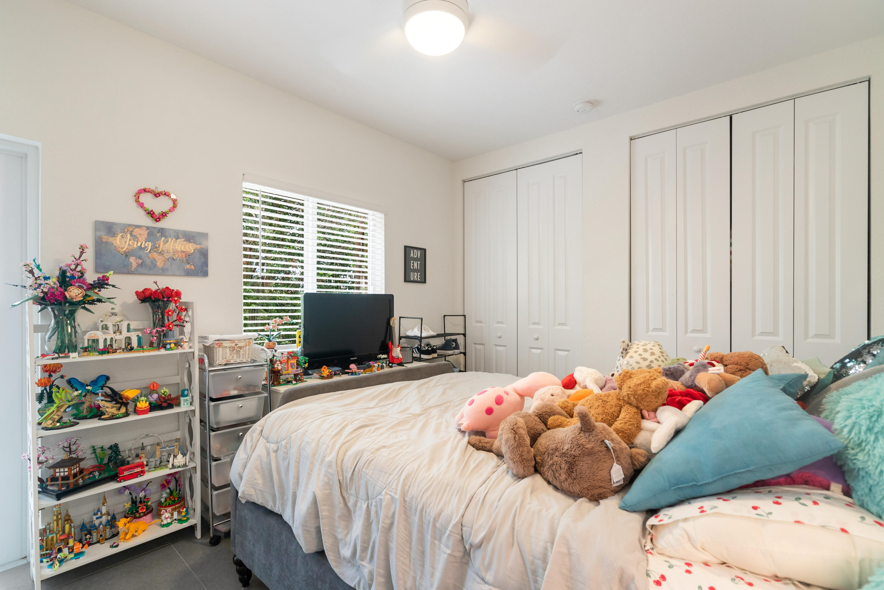 582 Boyd Drive Key Largo, FL 33037 - Photo 28 of 36 a bedroom with a bed and a window