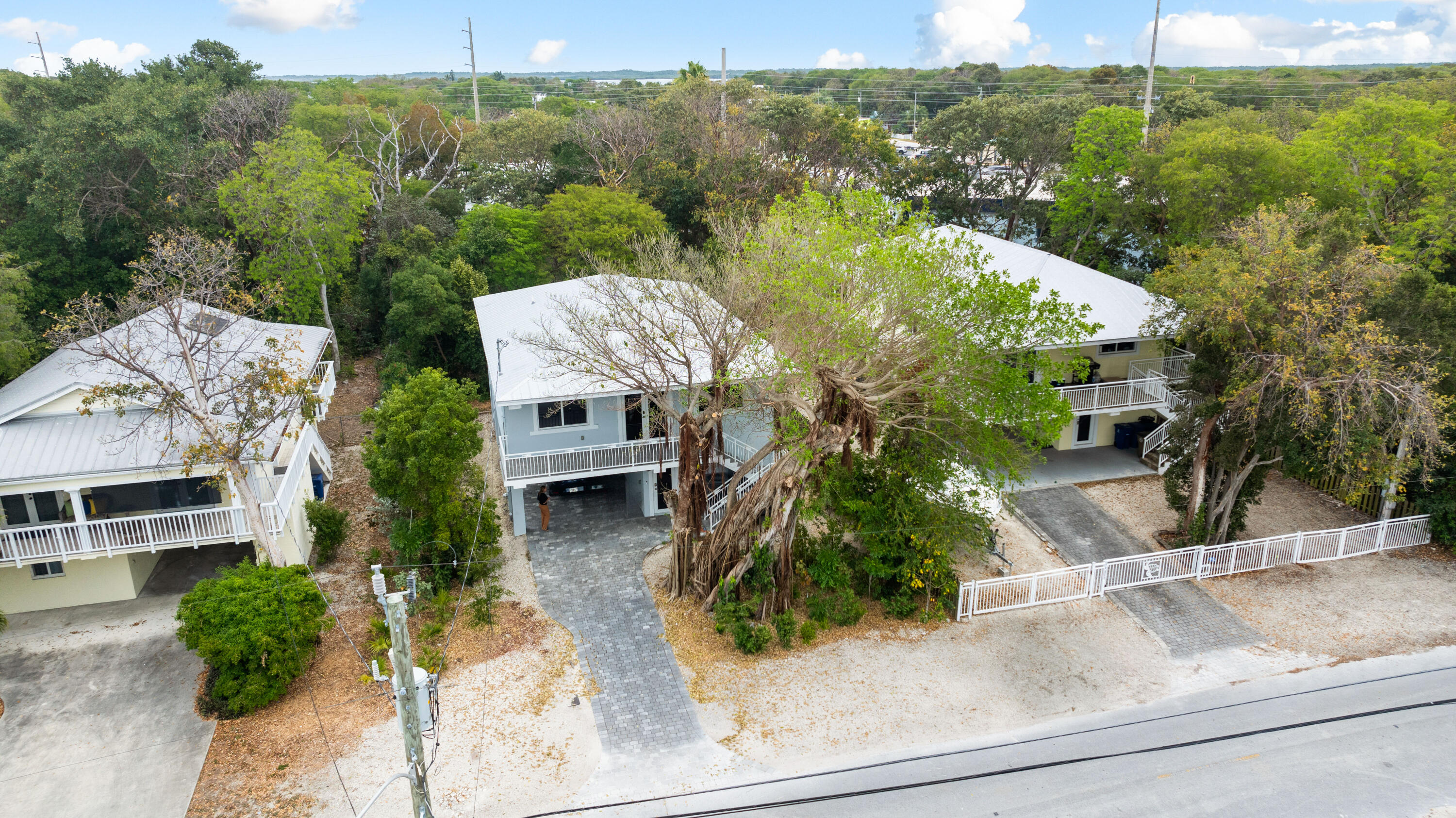 582 Boyd Drive Key Largo, FL 33037 - Photo 32 of 36 an aerial view of a house with a yard