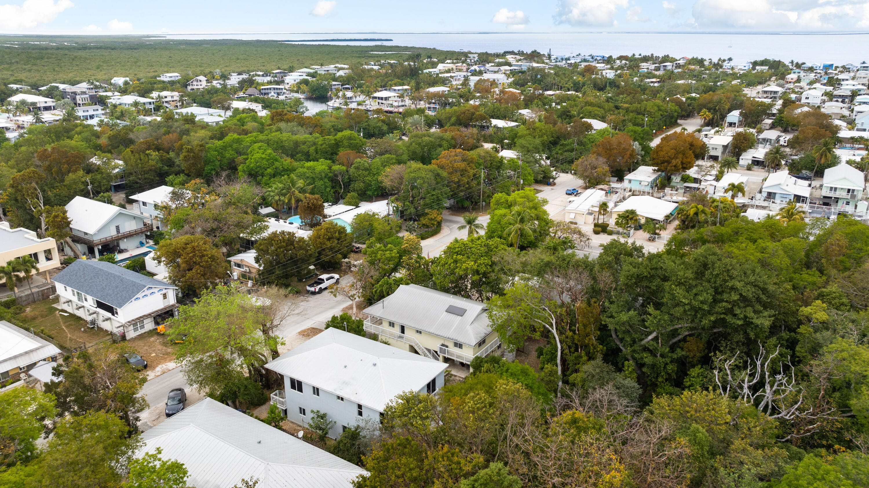 582 Boyd Drive Key Largo, FL 33037 - Photo 35 of 36 an aerial view of a house with a lake view