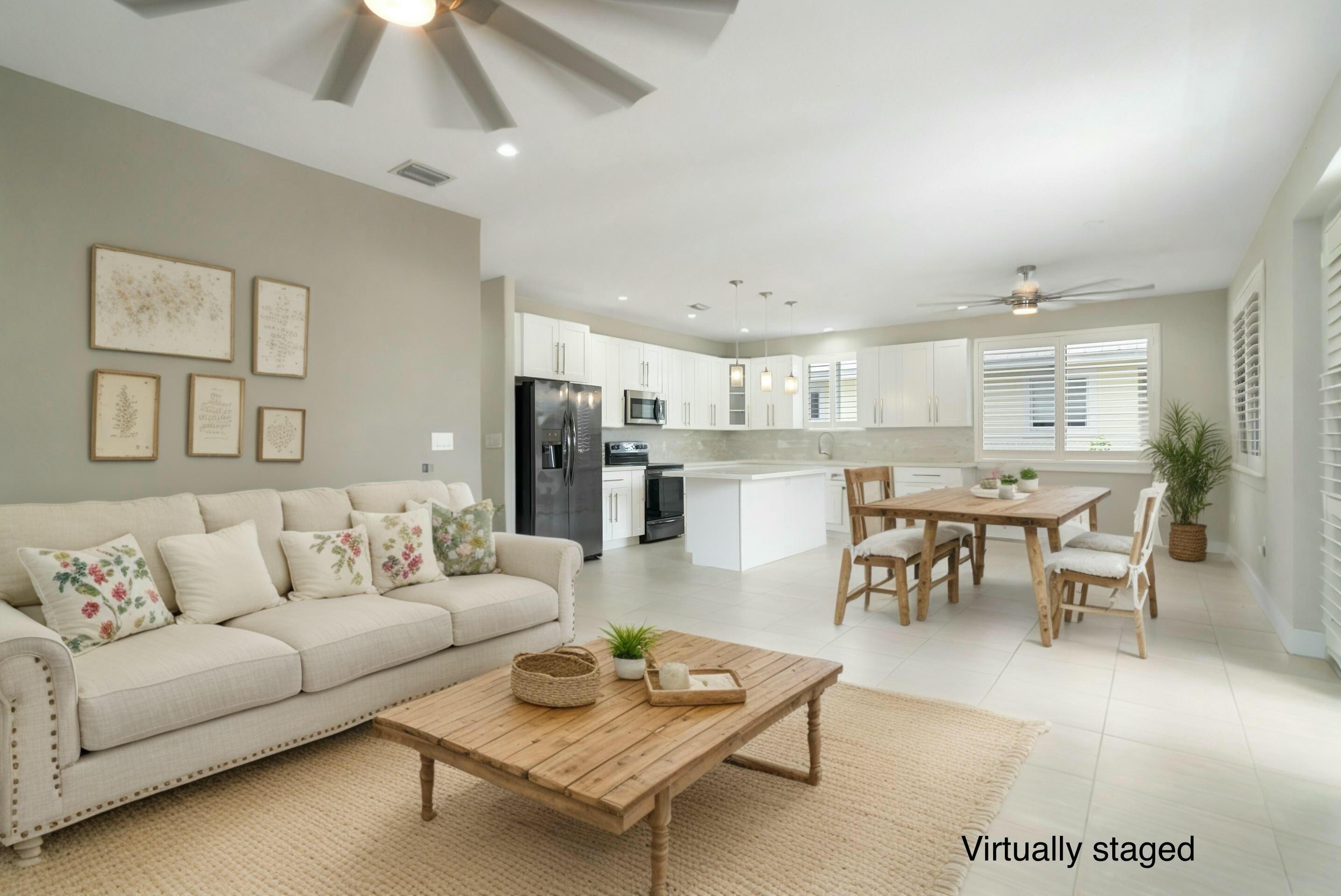 582 Boyd Drive Key Largo, FL 33037 - Photo 5 of 36 a living room with furniture kitchen view and a dining table
