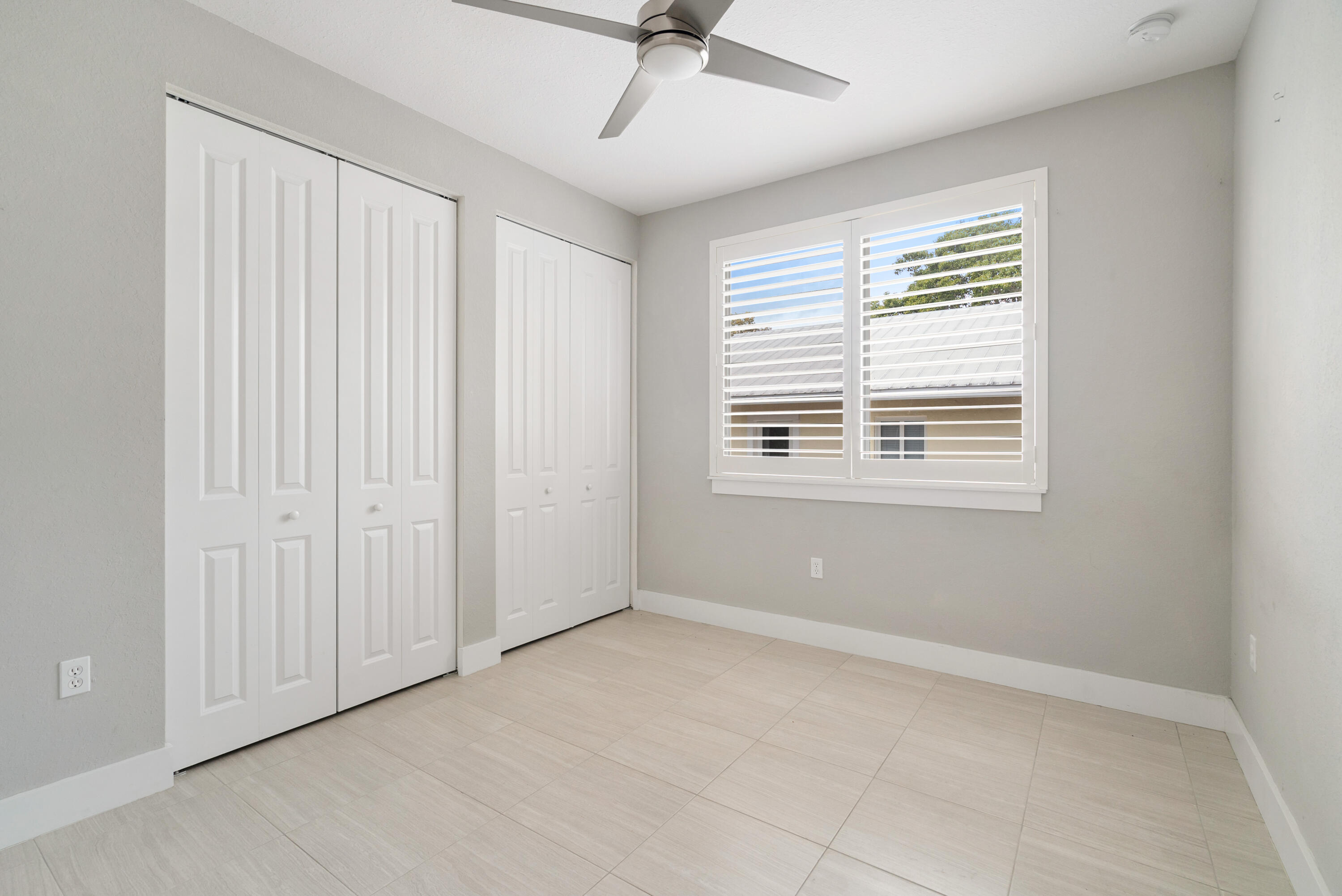 582 Boyd Drive Key Largo, FL 33037 - Photo 8 of 36 a view of an empty room with a window