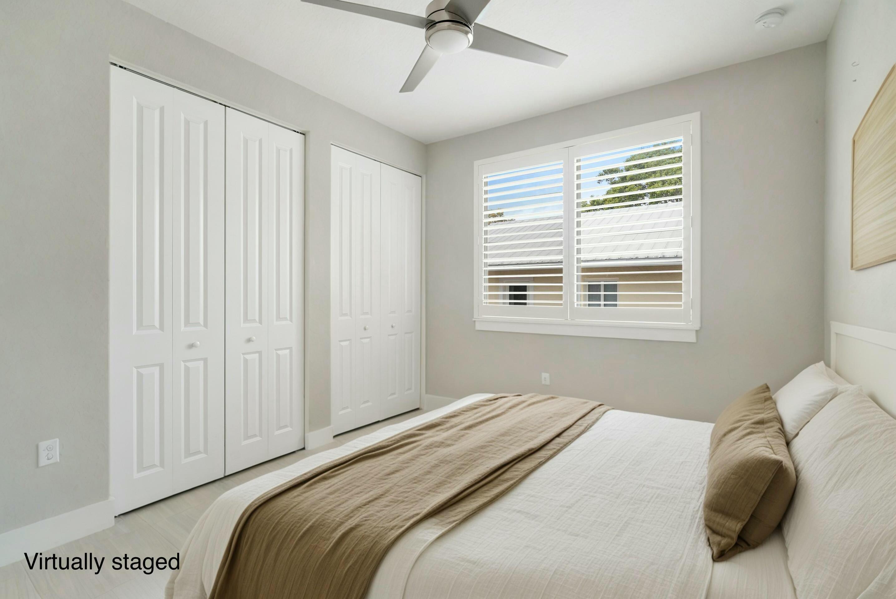 582 Boyd Drive Key Largo, FL 33037 - Photo 9 of 36 a bedroom with a bed and a window