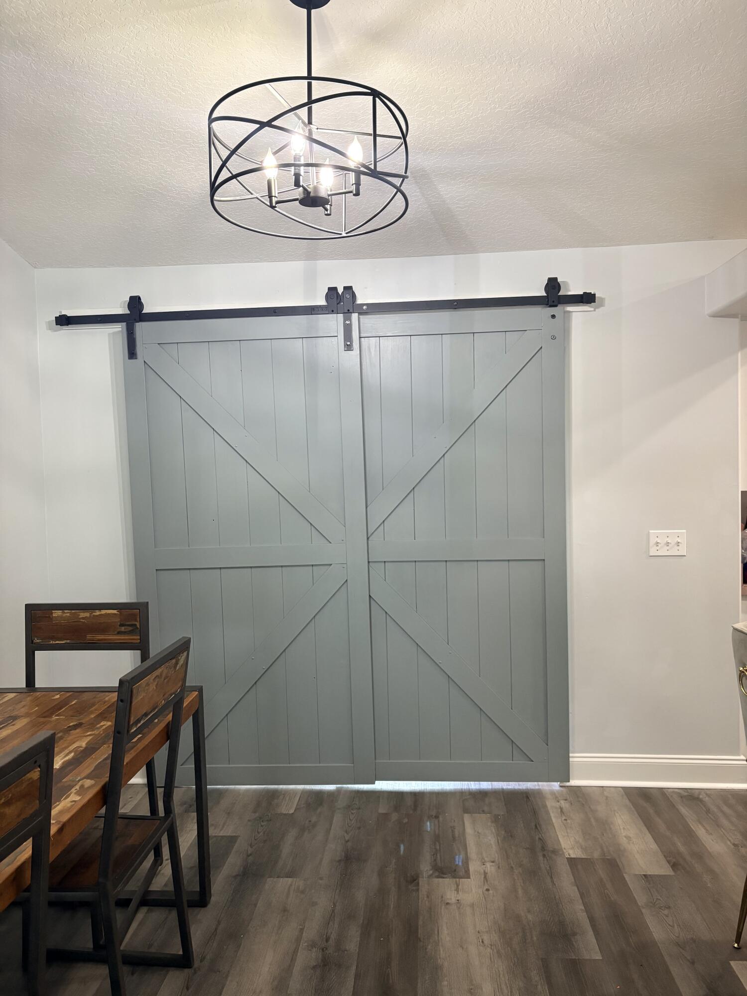 462 Southeast Cork Road Port St. Lucie, FL 34984 - Photo 16 of 57 a view of a room with wooden floor