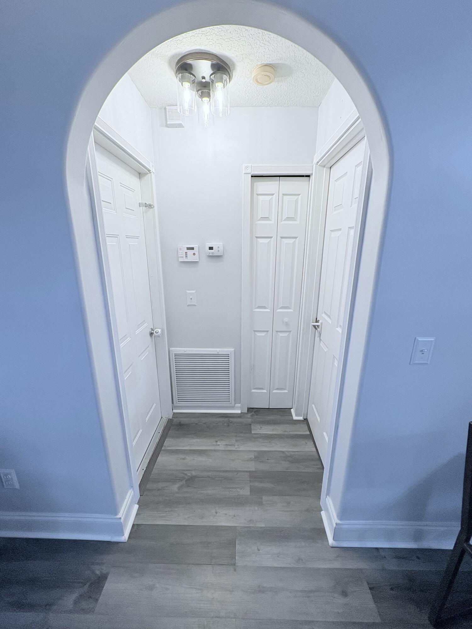 462 Southeast Cork Road Port St. Lucie, FL 34984 - Photo 27 of 57 a view of an entryway with front door