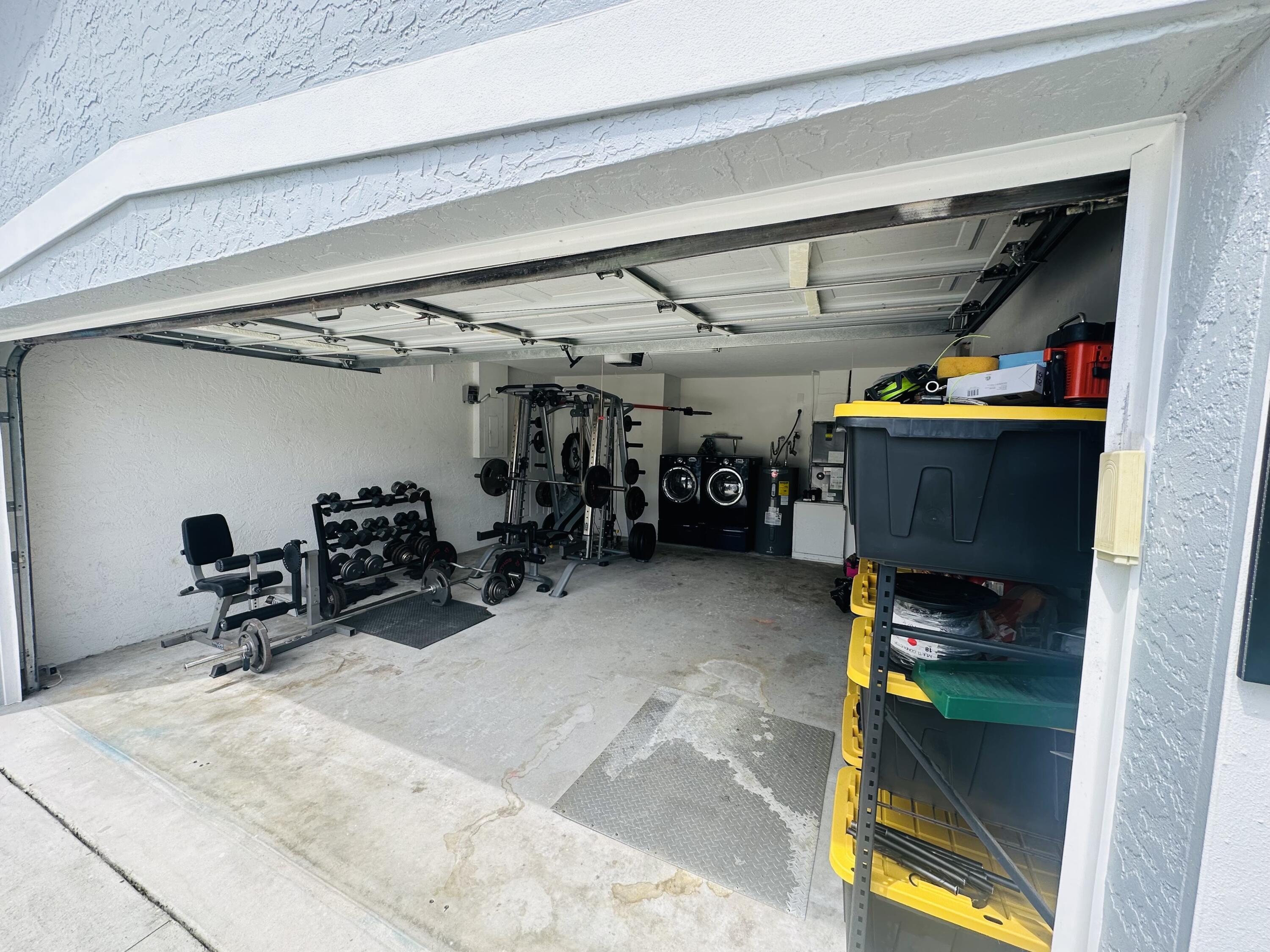 462 Southeast Cork Road Port St. Lucie, FL 34984 - Photo 43 of 57 a view of storage and utility room