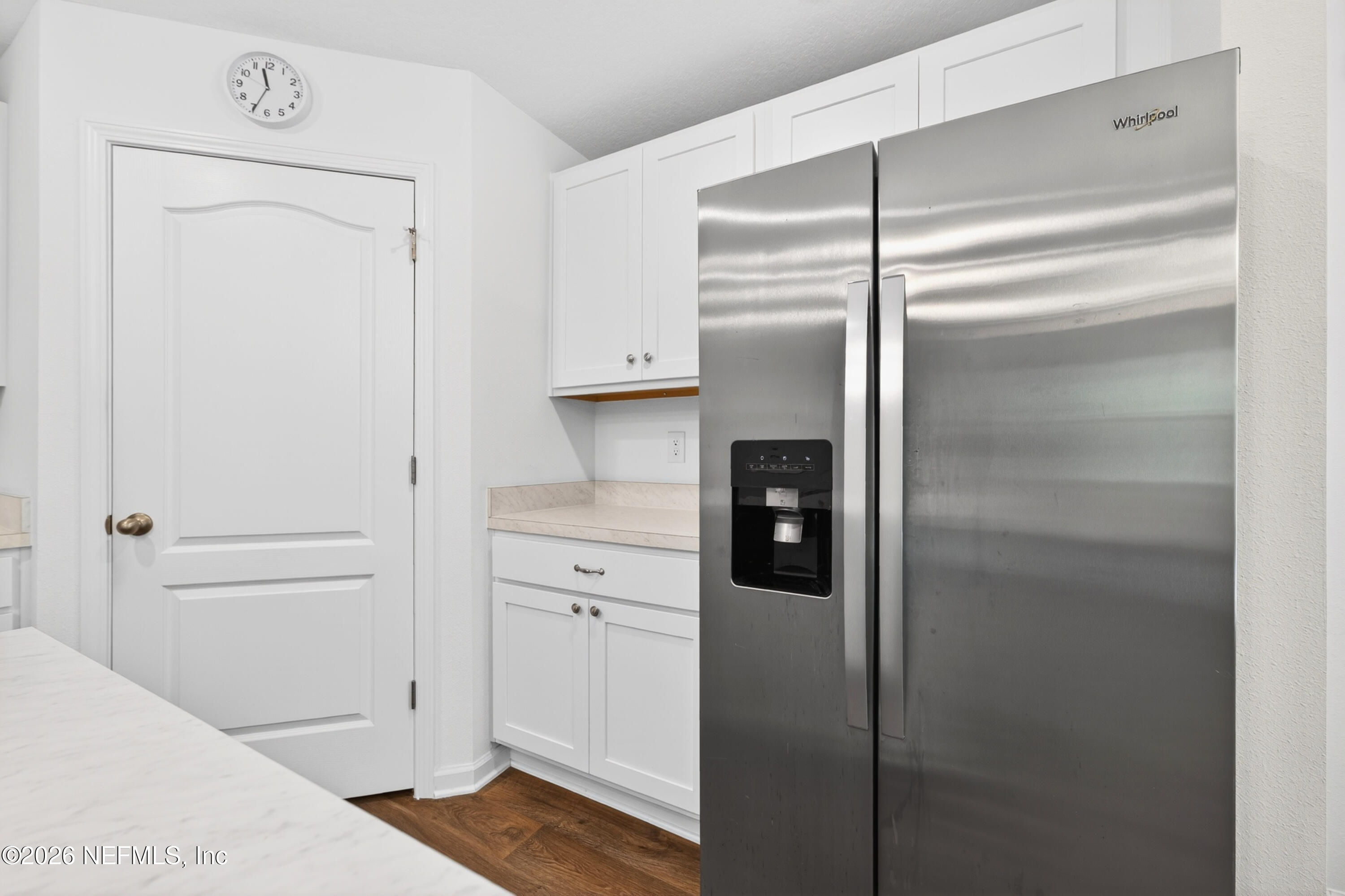 231 Encanto Way Street St. Augustine, FL 32084 - Photo 13 of 36 a kitchen with cabinets and stainless steel appliances