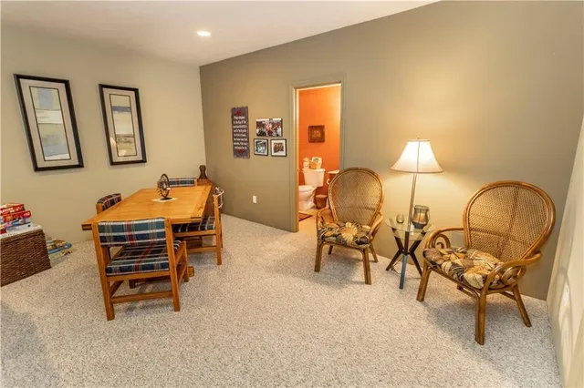 a room with furniture and lamp