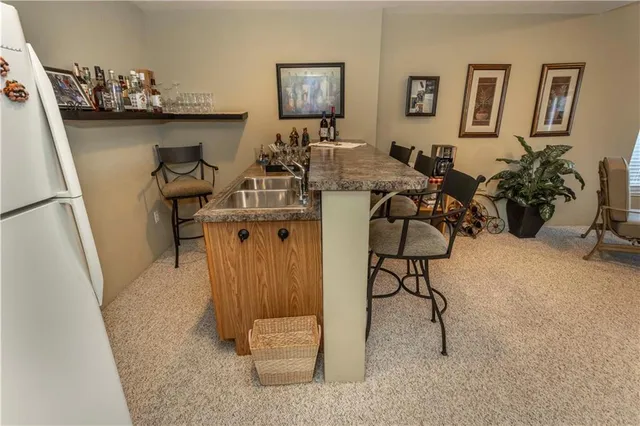 a view of a workspace with furniture